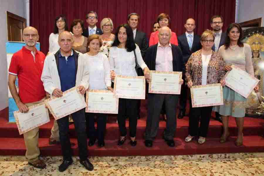Flores, recuerdo a los alcazareños ausentes y procesión en las Fiestas en honor de la Virgen del Rosario 11