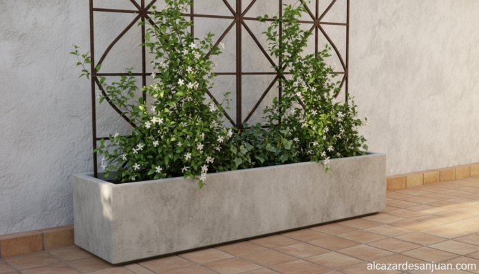 A modern outdoor planter with a decorative trellis support for climbing plants like jasmine and ivy on a Mediterranean-sty...