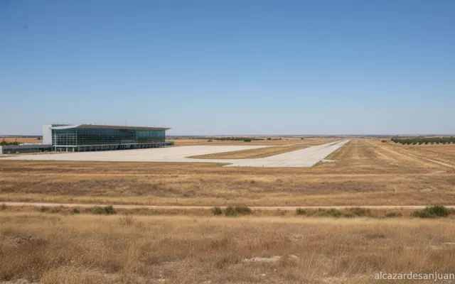 An empty regional airport terminal building in the Spanish province of Ciudad Real, Castilla-La Mancha. Wide view showing ...