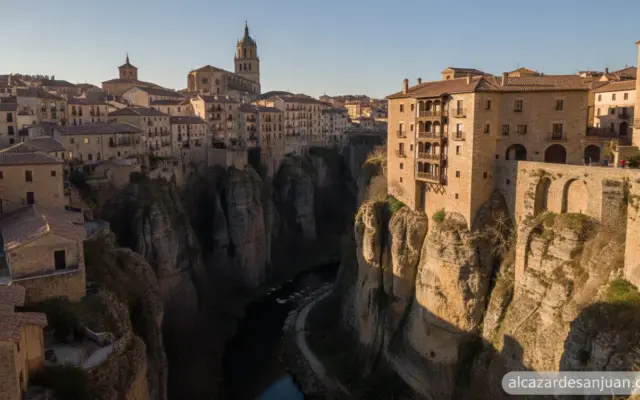 Scenic view of Cuenca, Spain, with historic hanging houses (Casas Colgadas) over the gorge, sunny day, stone architecture,...